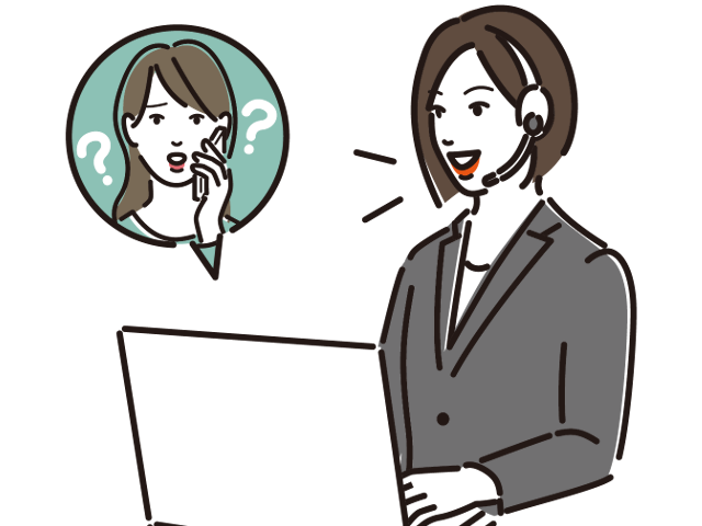 顧客の質問に対応しているコールセンターの女性