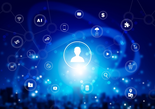 人型のシルエットを中心に散りばめられたAIやクラウドなどのアイコン